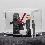 Two LEGO minifigures in a clear acrylic display case